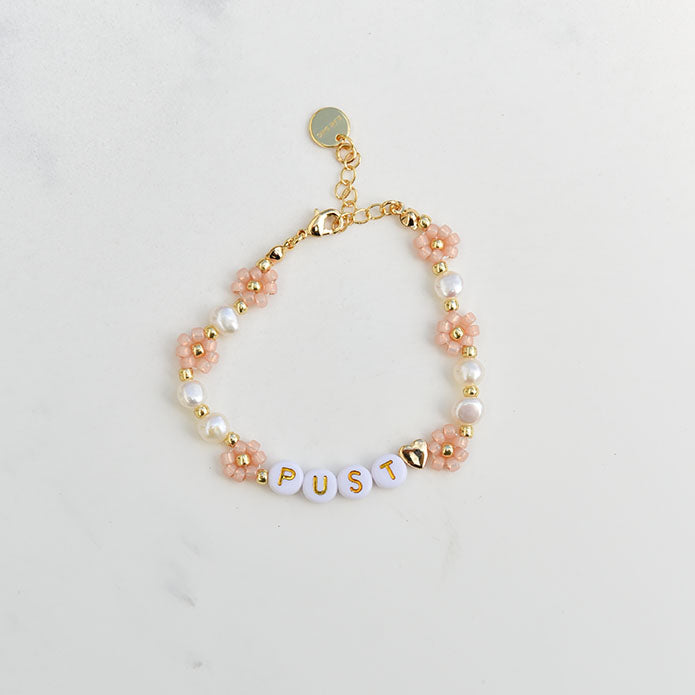 Pust blomsterarmbånd fersken