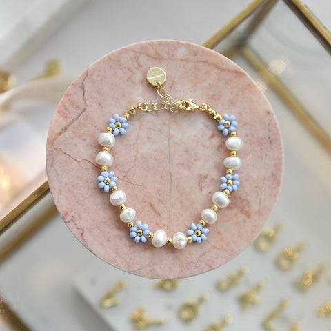 Linn  blomsterarmbånd lyseblå