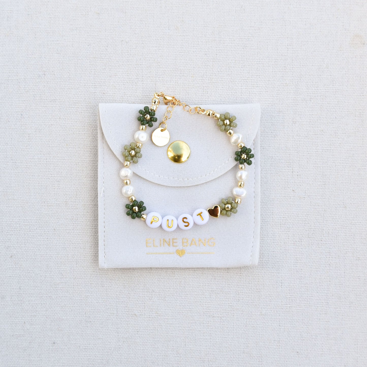 Pust blomsterarmbånd grønn